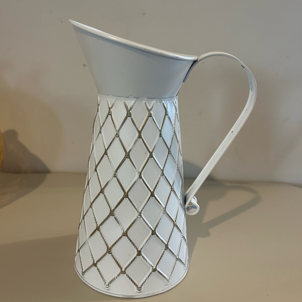 Decorative metal pitcher